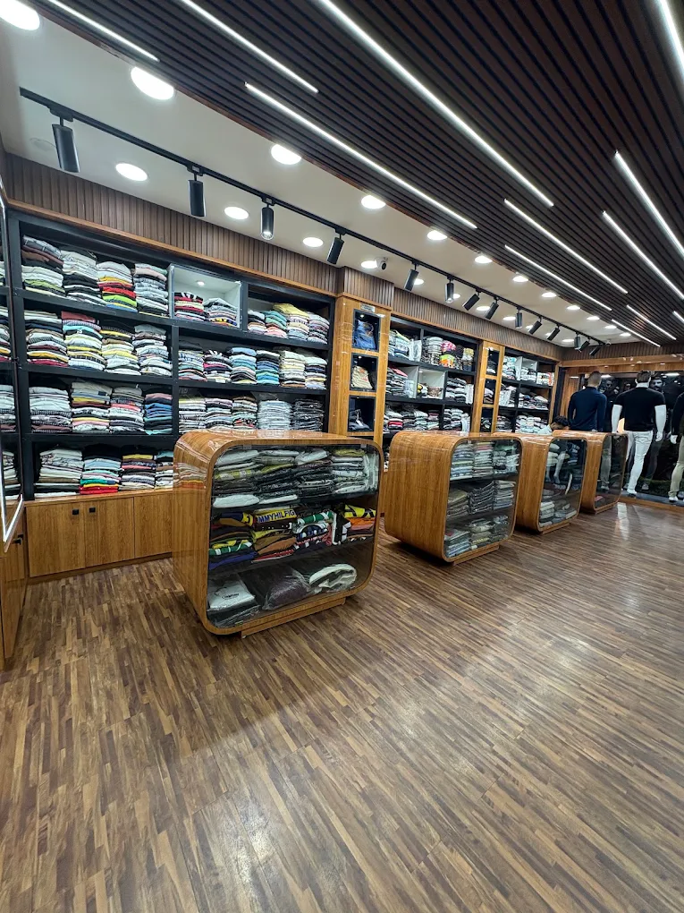 Display units of folded clothing on the showroom floor